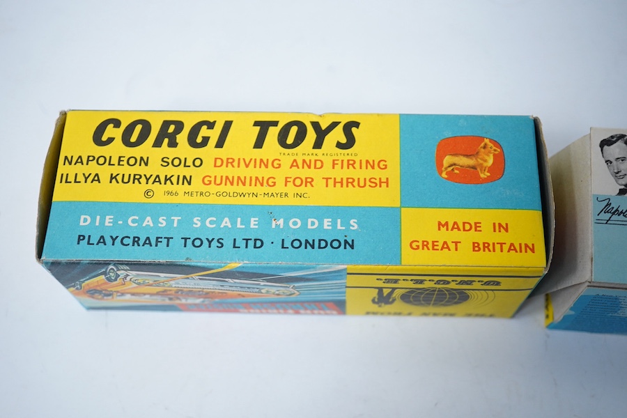 A boxed Corgi Toys (497) Man From Uncle boxed Thrush-Buster, Oldsmobile super 88, together with the Waverly ring, and inner card display stand. Condition - good.